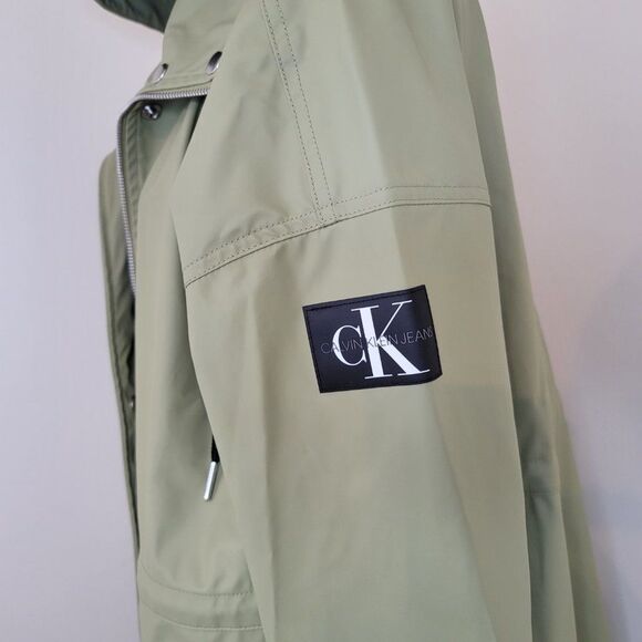 Calvin Klein Jeans Solid Monogram Logo Patch Hooded Rain Jacket - Picture 6 of 10